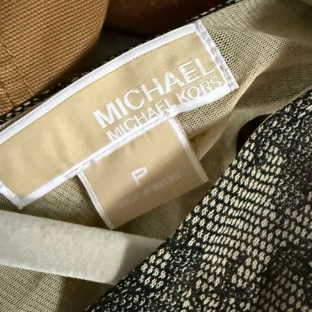 Michael Kors black and nude sleeveless blouse with an asymmetrical hem size P